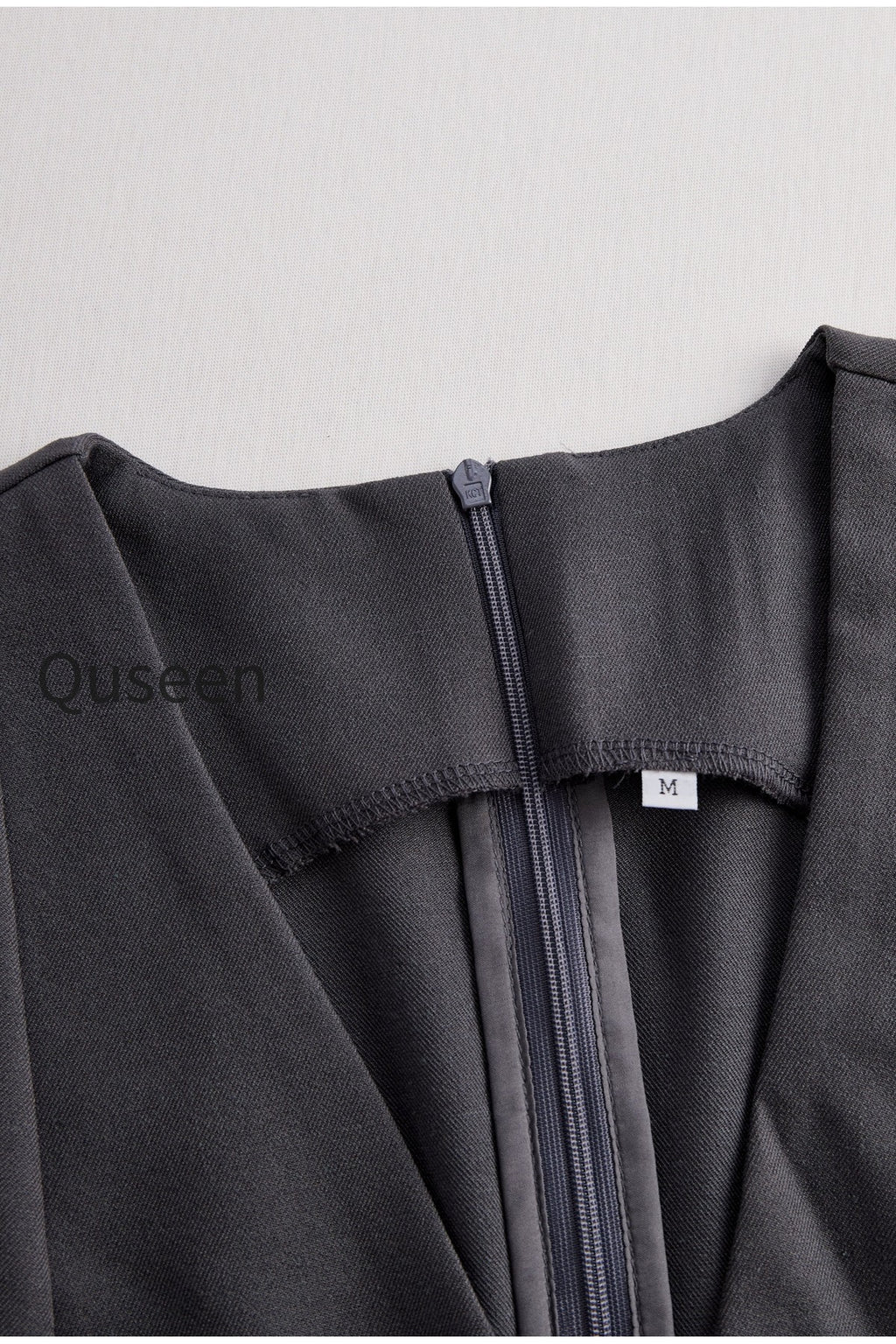 Sophisticated Sleeveless Peplum Jumpsuit In Charcoal Gray