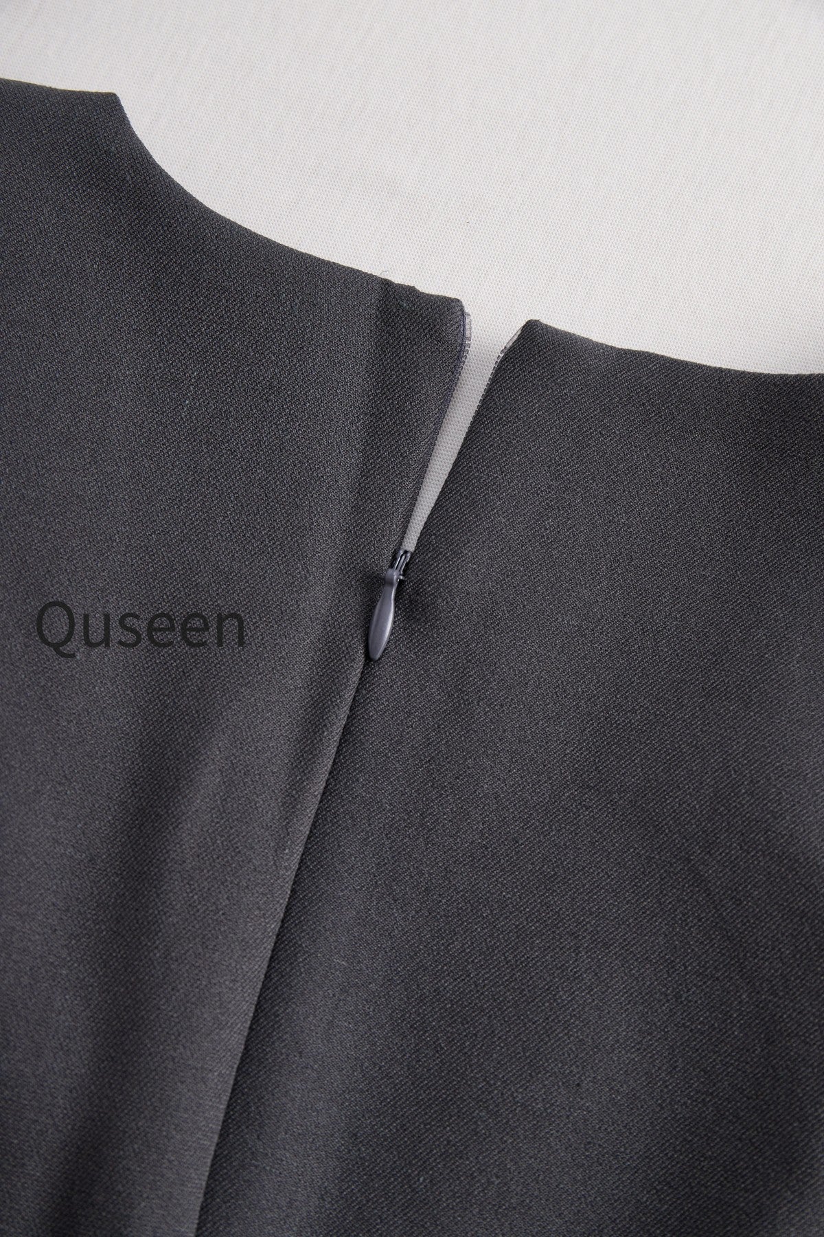 Sophisticated Sleeveless Peplum Jumpsuit In Charcoal Gray