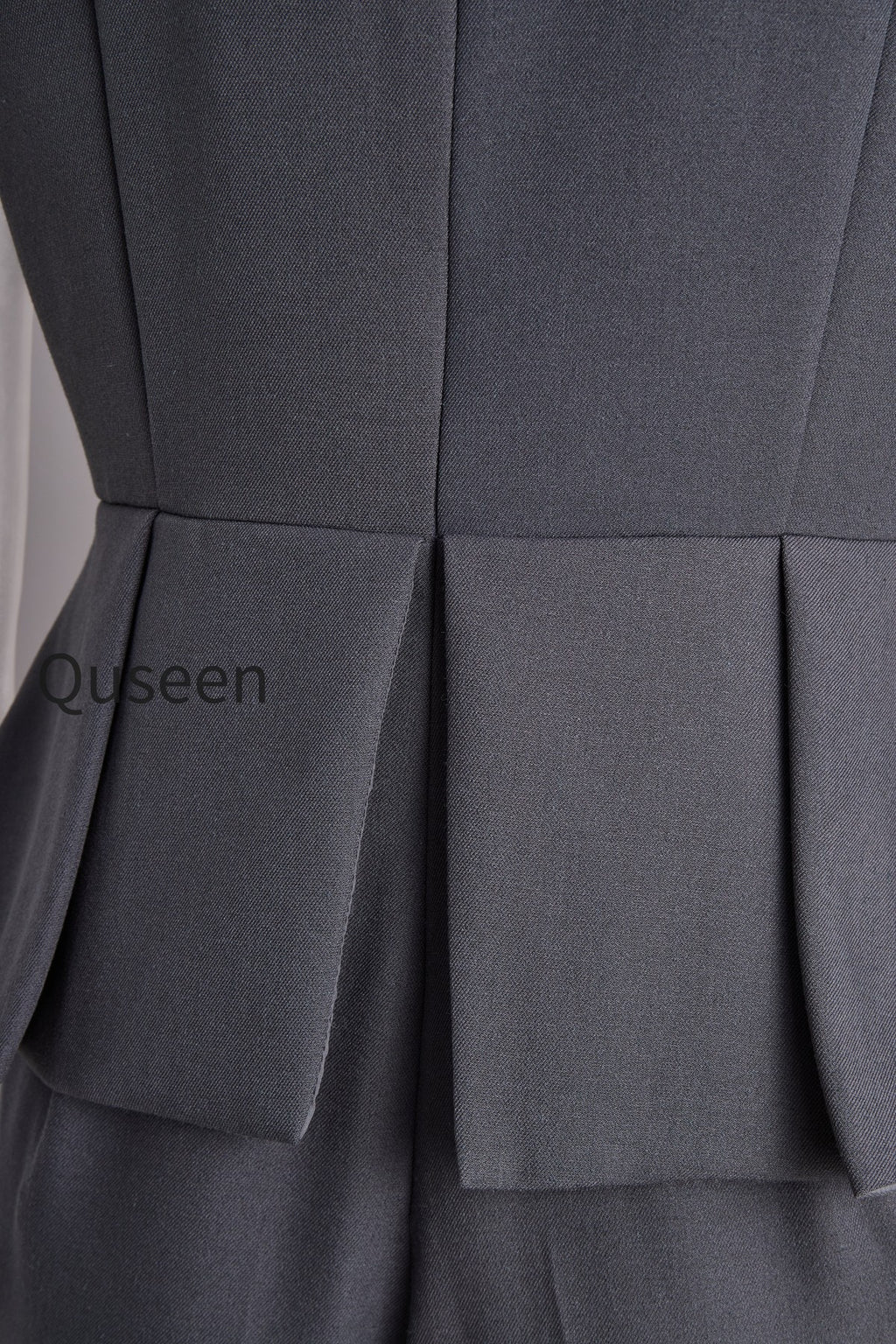 Sophisticated Sleeveless Peplum Jumpsuit In Charcoal Gray